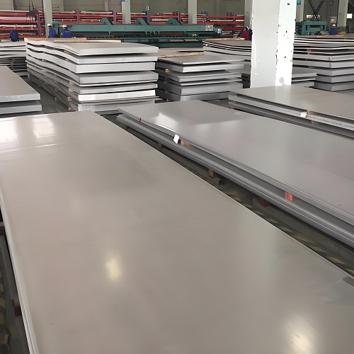 Coils and cut plates of 304 stainless steel in the warehouse ready for dispatch